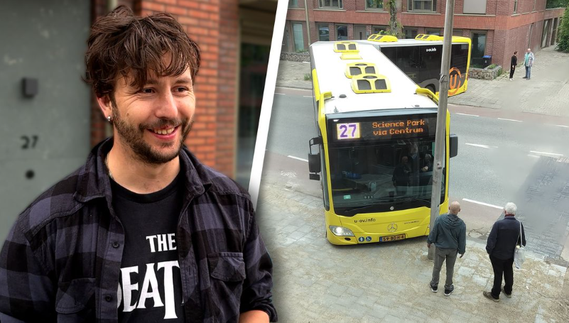Man en een lijn bus